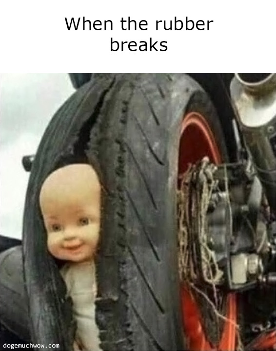 When the rubber breaks. Picture of baby doll popping out of a broken tire.